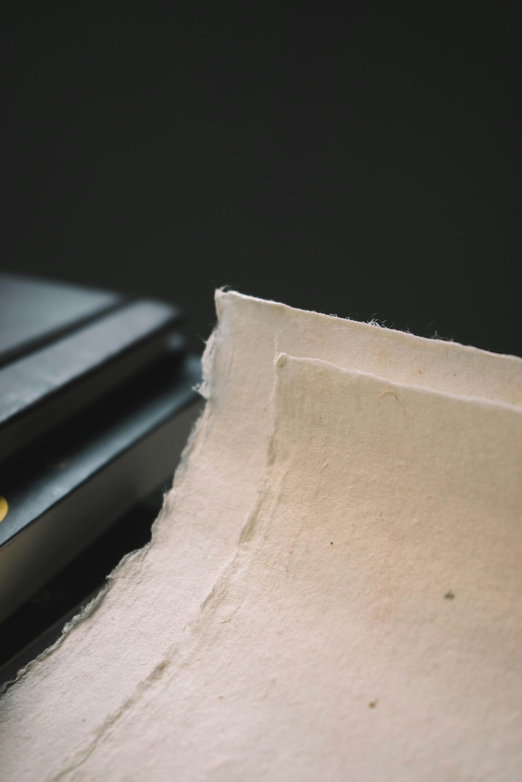 Explore the invention of paper and its use in spreading knowledge across civilizations.