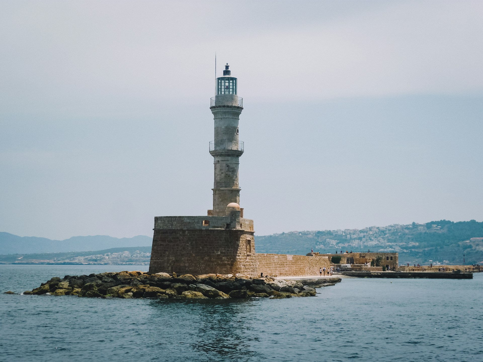 Learn how harbors and lighthouses transformed sea travel in antiquity.